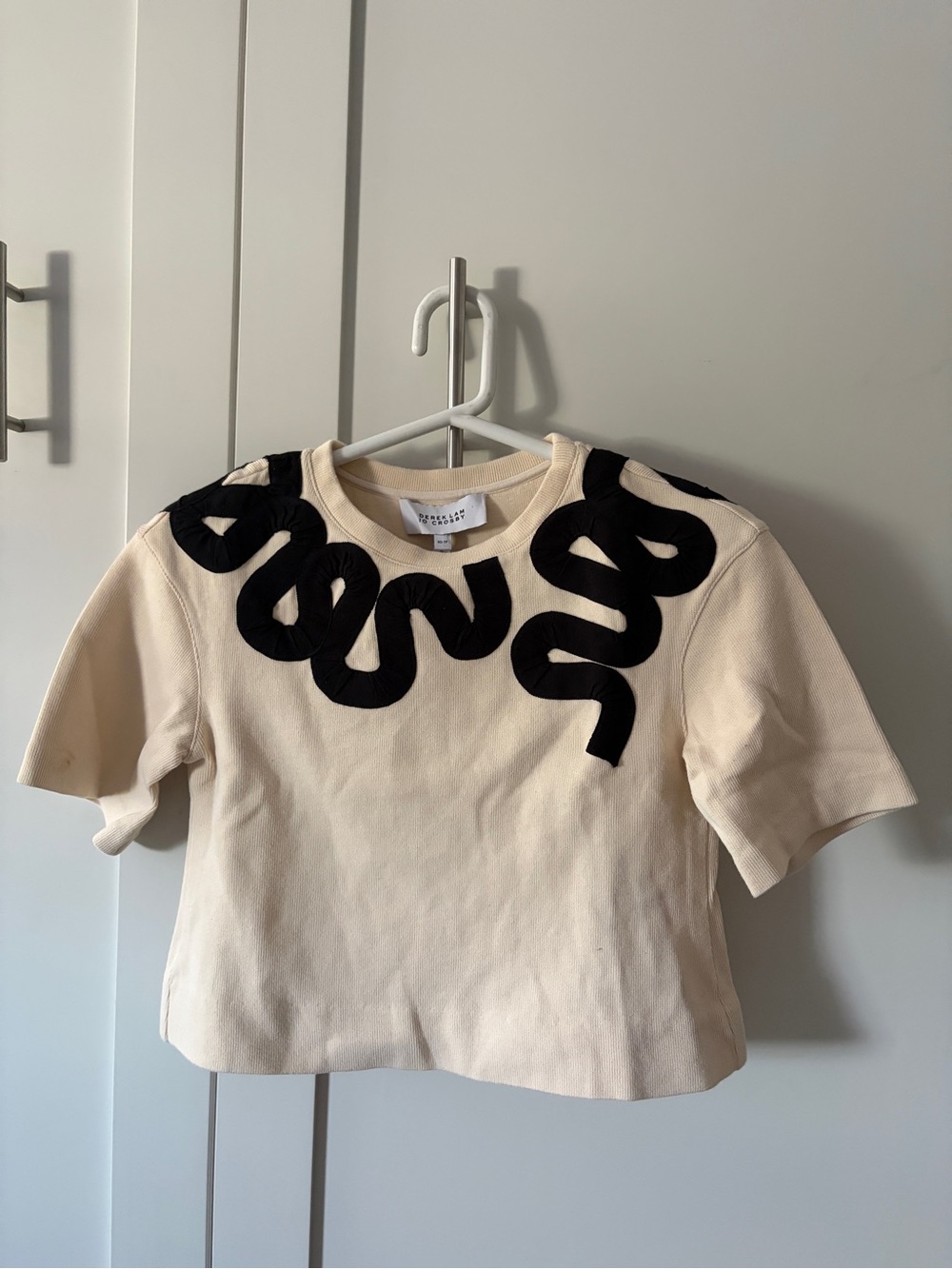 10 Crosby Derek Lam Cream Short-Sleeve Top with Black Appliqué